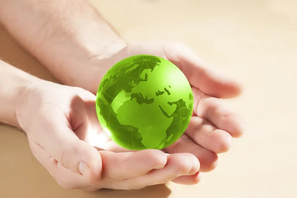 Globo de vidrio en mano — Foto de Stock