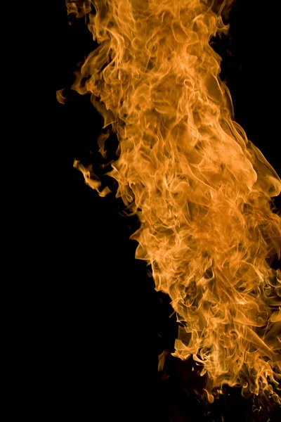 Eld och lågor på en svart bakgrund — Stockfoto