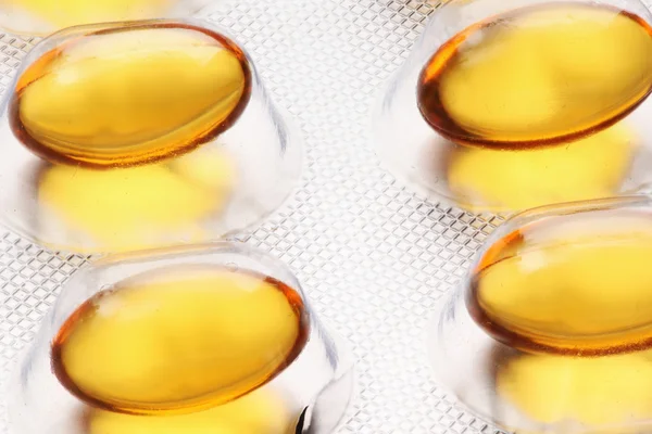 Fish oil pills over — Stock Photo, Image