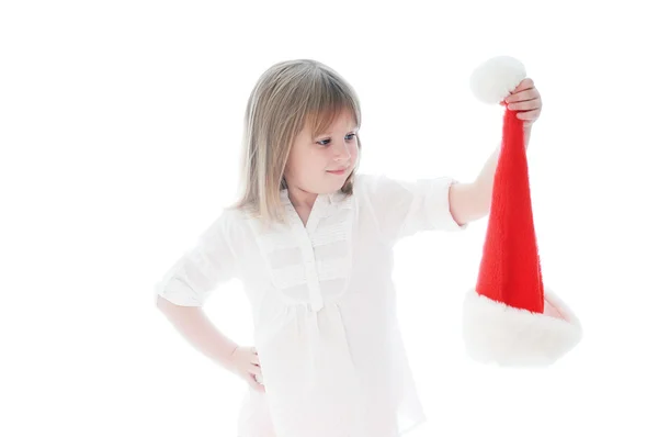 Noel Baba şapkası ile kız beyaz arka plan üzerinde poz