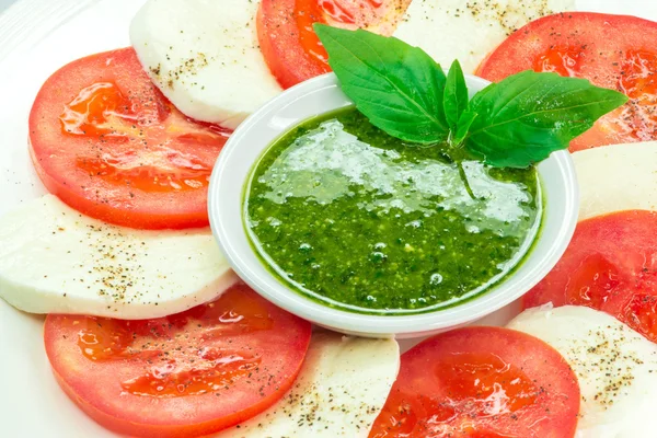 Appetizer with cheese and tomatoes — Stock Photo, Image