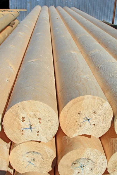 The round calibrated building bar from a tree — Stock Photo, Image