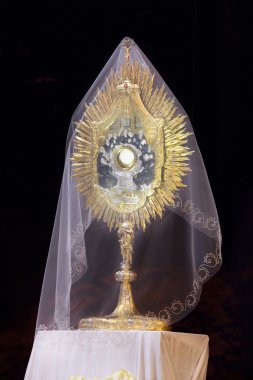 Monstrance with the body of Christ clipart