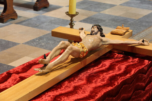 Wooden figure of Jesus crucified, in the church during Easter
