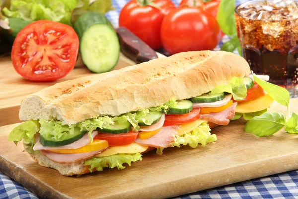 Baguette salad submarine sandwich with ham cheese and tomato on — Stock Photo, Image