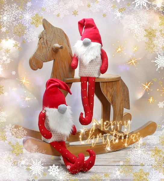 Two Elves Sitting Rocking Horse Merry Christmas Inscription — Fotografia de Stock