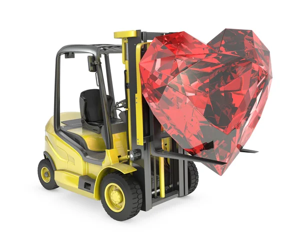 Fork lift truck lifts heart cut ruby — Stock Photo, Image