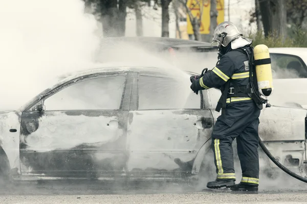 Brandweerman blussen van — Stockfoto