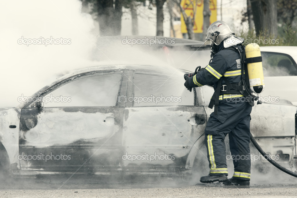 Fireman putting out