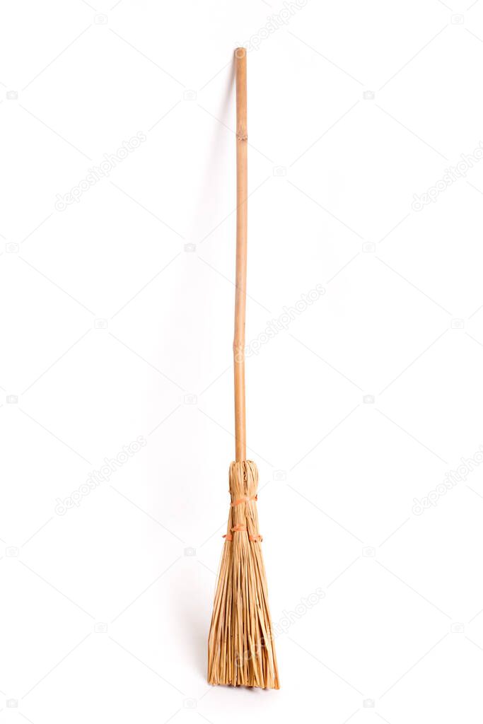 ancient broom isolated on white background