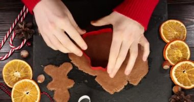 Christmas gingerbread cookies. Christmas baking background. Super slow motion.
