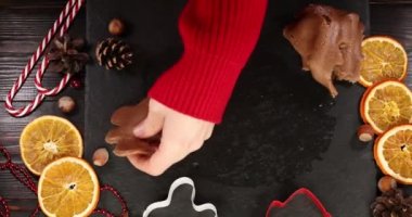 Christmas gingerbread cookies. Christmas baking background. Super slow motion.