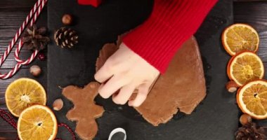 Christmas gingerbread cookies. Christmas baking background. Super slow motion.