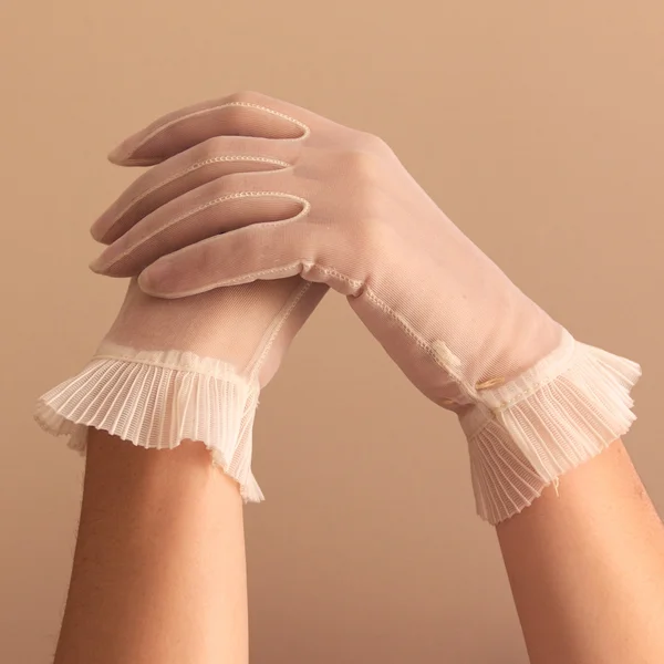 Female hands modeling vintage sheer gloves — Stock Photo, Image