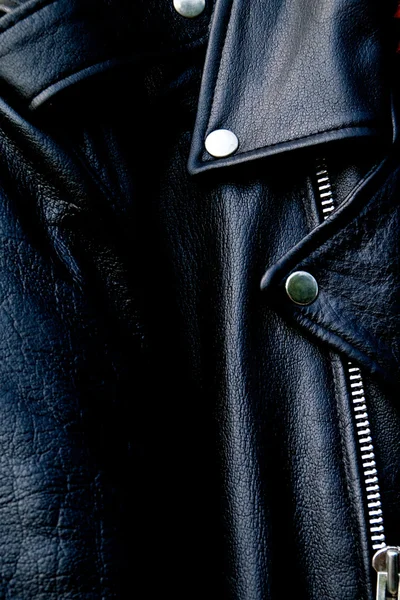 High contrast black leather biker jacket up close — Stock Photo, Image