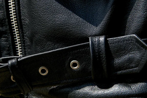 Close up of black leather biker jacket belt — Stock Photo, Image