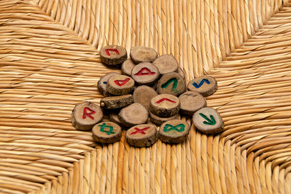 Runes on rattan surface