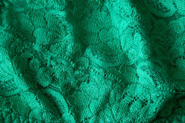Groene kant materiaal close-up kant verlichting — Stockfoto