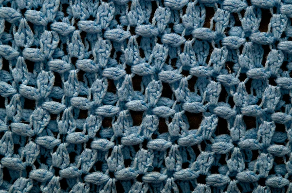 Närbild på blå virkad afghanska filt — Stockfoto