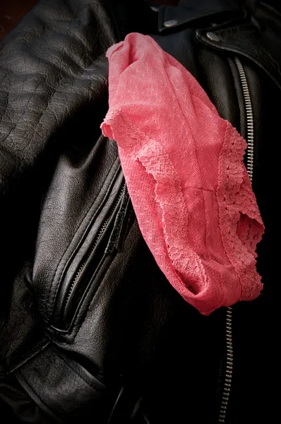 Sexy pink lace panties and leather jacket — Stock Photo, Image