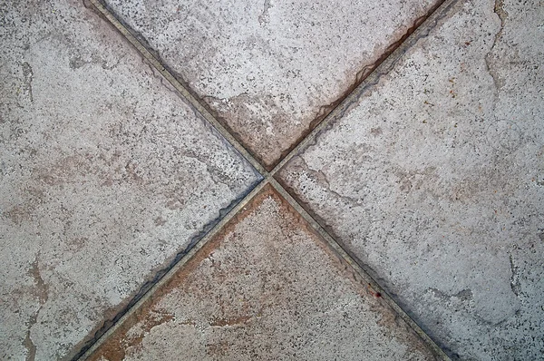 X formed by floor tiles — Stock Photo, Image