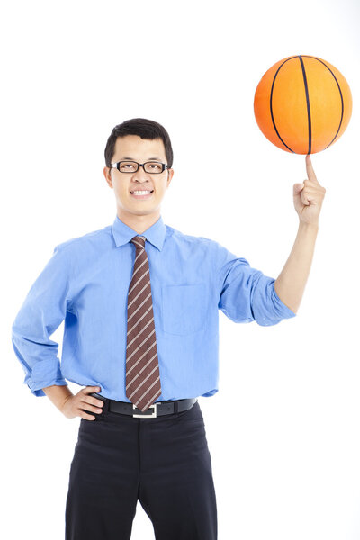 Young businessman with basketball