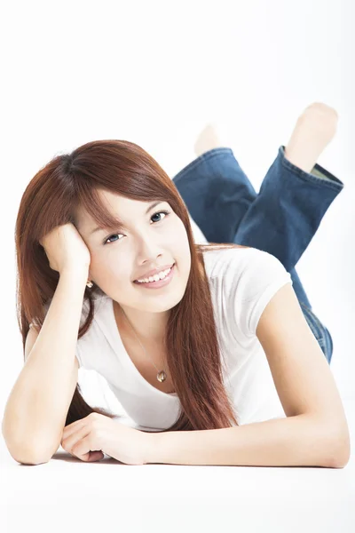 Beautiful asian young woman lying on the floor — Stock Photo, Image