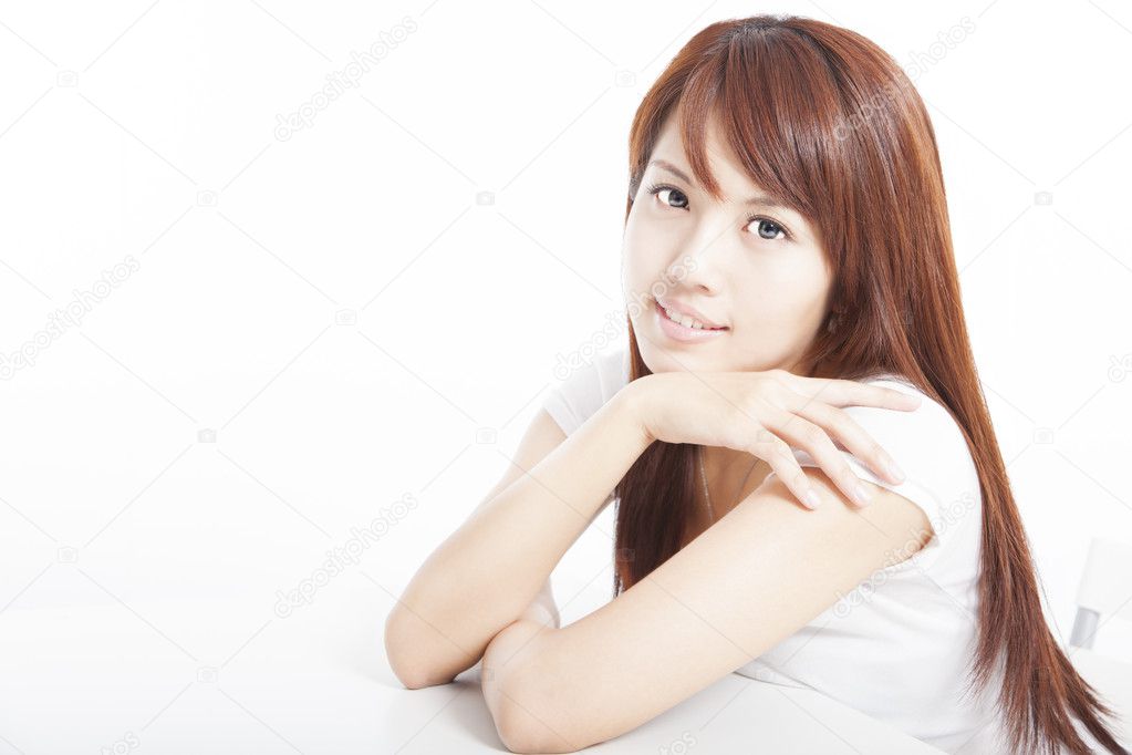 Beautiful asian young woman sitting on chair isolated