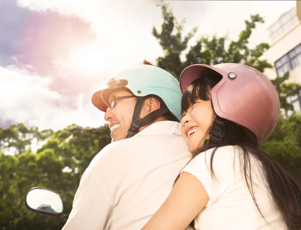 Happy father with daughter on the bike — Stock Photo, Image