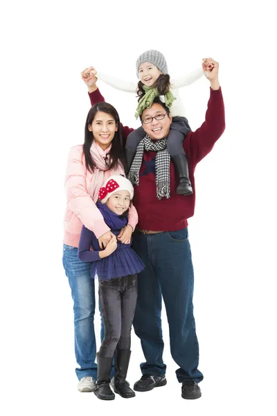 Full length of happy asian family in winter clothes standing tog — Stock Photo, Image