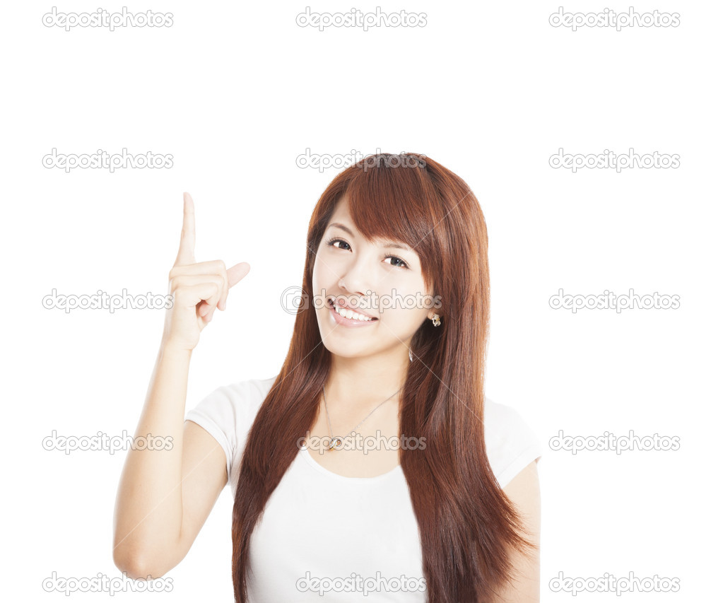 Young asian Woman smiling and pointing up
