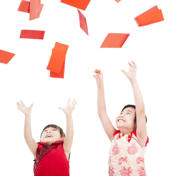 Happy chinese new year.two asian kids trying to catch red envel — Stock Photo, Image