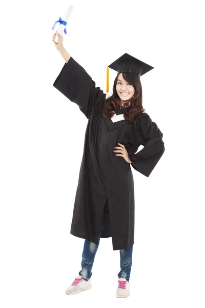 Pełnej długości piękny młody graduacyjnej kobieta stojąc — Zdjęcie stockowe
