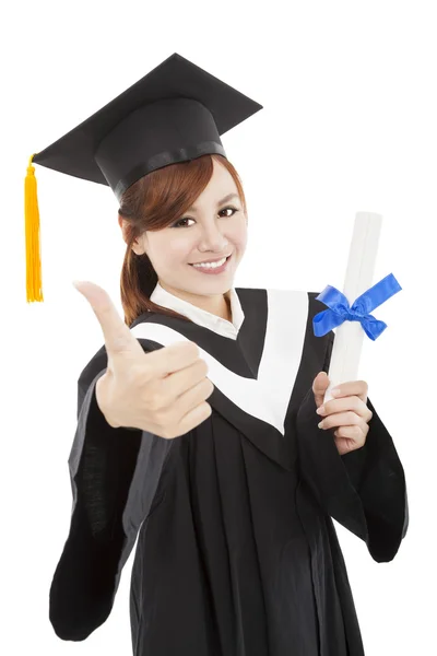 Sorridente laureata donna con grado e pollice in su — Foto Stock