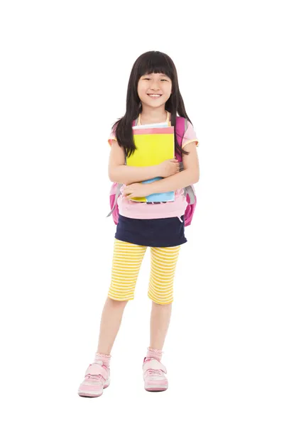Full length of asian little girl standing and holding books — Stock Photo, Image