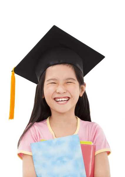 Glückliches kleines Mädchen mit Büchern in der Hand — Stockfoto