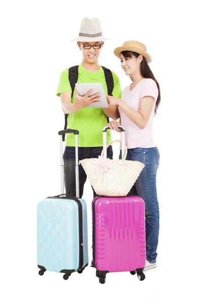 Feliz pareja turista con tablet pc — Foto de Stock