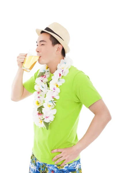 Happy young man drinking beer at summer — Stock Photo, Image