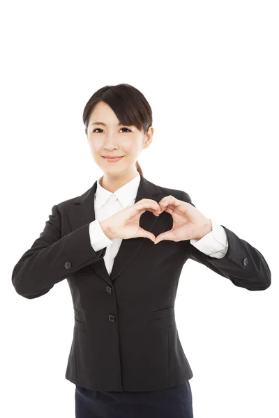 Jovem empresária mostrando coração por suas mãos — Fotografia de Stock