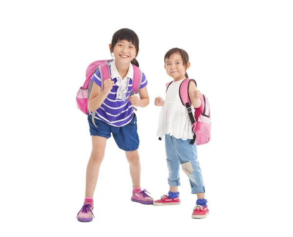 Sırt çantası ile mutlu küçük kızlar — Stok fotoğraf