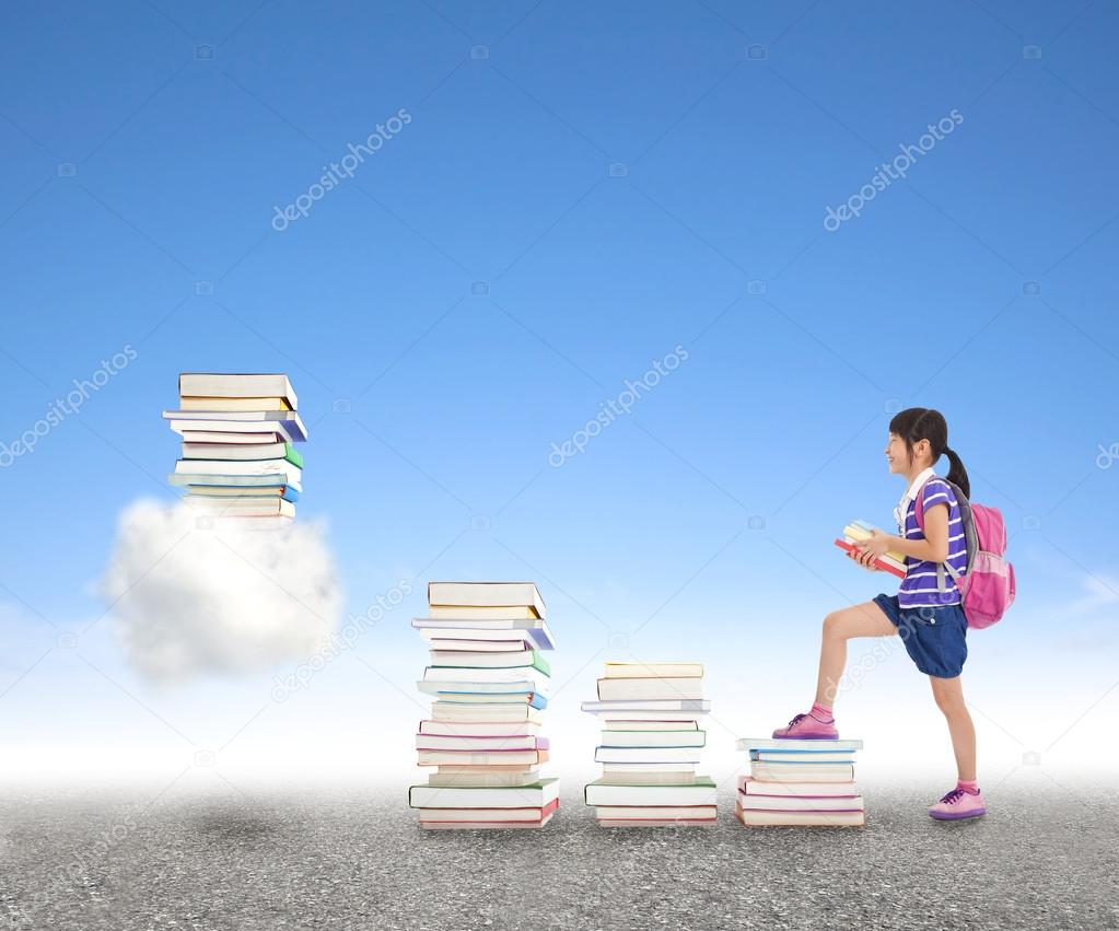 school girl learning knowledge from books to the cloud computing