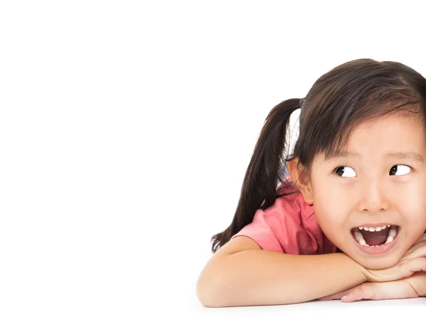 De cerca la cara sorprendida de la niña buscando algo — Foto de Stock