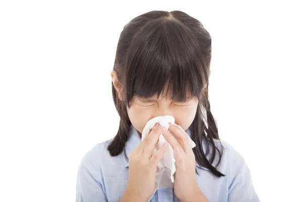 Little girl blows her nose — Stock Photo, Image