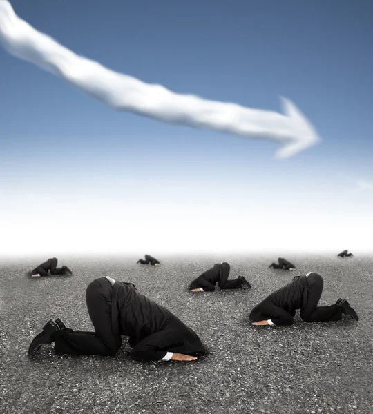 Scared businessman hiding on the ground with business graph down — Stock Photo, Image