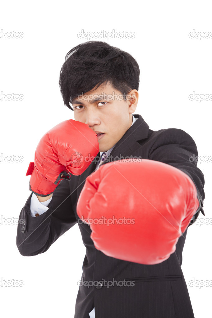 young businessman with boxing gloves