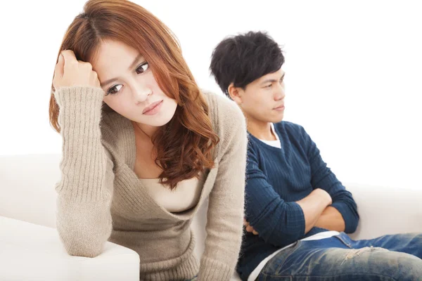 Young Couple sitting on the sofa during conflict — Stock Photo, Image