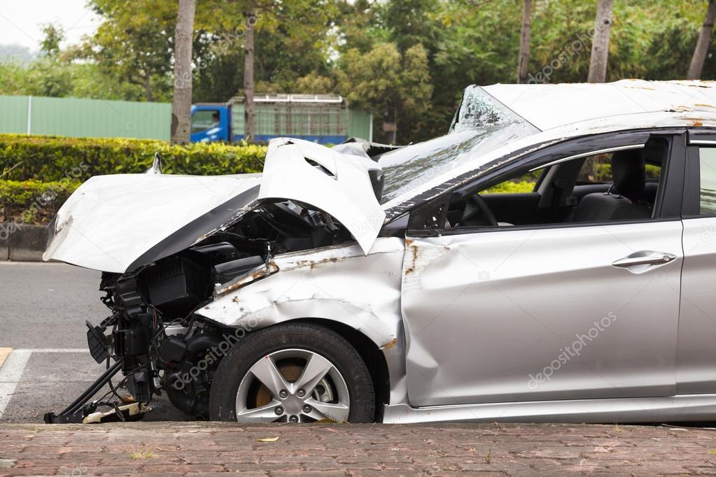 car accident and wrecked car on the road