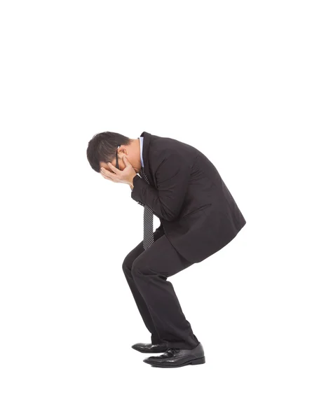 Suffering businessman squat to feel disappointment — Stock Photo, Image