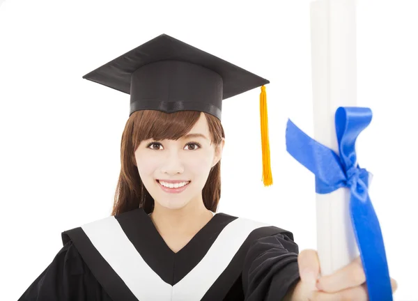 Pretty Young graduate girl student holding and showing diploma — Stock Photo, Image