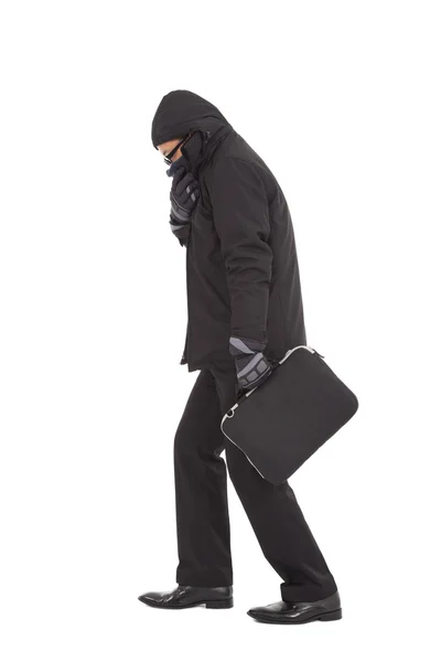 Young businessman shudder body and holding briefcase — Stock Photo, Image